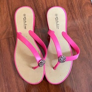 Pink Flip Flops with Toe Adornment by White Line